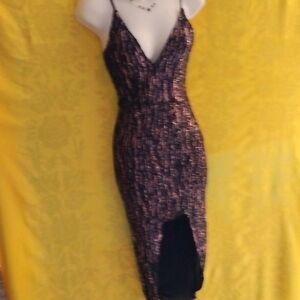 Madrag maxi beautiful dress completely embellished by gold Sequins.